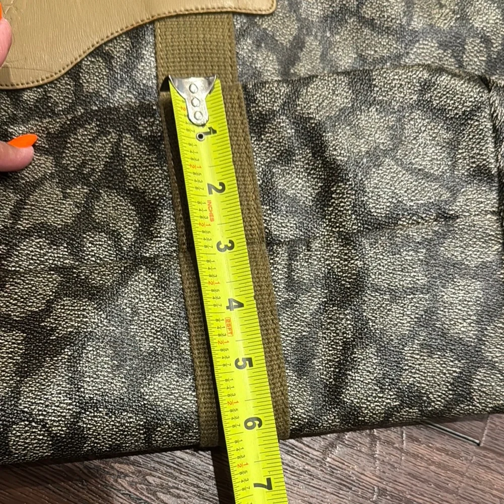 Yves Saint Laurent Pre Owned printed Signature Weekend Duffel Bag.
